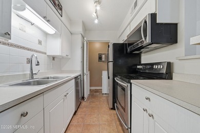Great opportunity on this ground-level condo in the heart of - photo 8