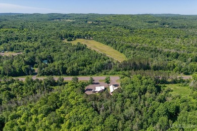 This property includes both a 4 BR, 2 BA home and a renowned & - photo 56