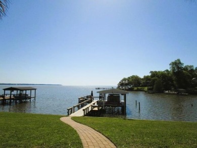 WOW!  Do not let this prime waterfront home in Santee Cooper - Lake Home Sale Pending in Santee, South Carolina