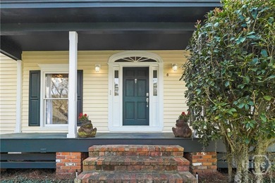 The welcoming front porch overlooks peaceful coastal marsh and - photo 8