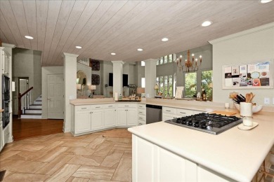 WONDERFUL HOME NESTLED IN THE WOODS ALONG TERRI PINES GOLF