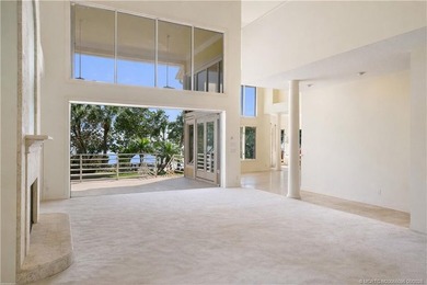 Framed by swaying palms and endless water views, this estate - photo 13