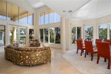Framed by swaying palms and endless water views, this estate - photo 16