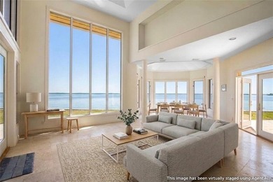 Framed by swaying palms and endless water views, this estate - photo 17