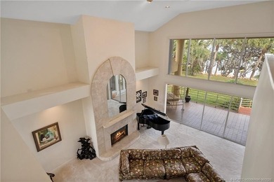 Framed by swaying palms and endless water views, this estate - photo 18