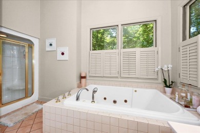 WONDERFUL HOME NESTLED IN THE WOODS ALONG TERRI PINES GOLF