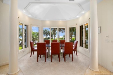 Framed by swaying palms and endless water views, this estate - photo 19