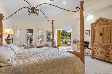 Framed by swaying palms and endless water views, this estate - photo 20