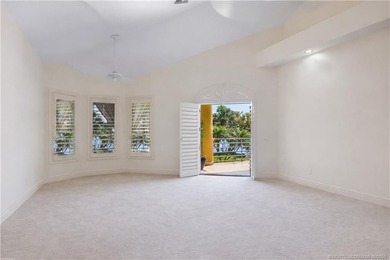 Framed by swaying palms and endless water views, this estate - photo 21