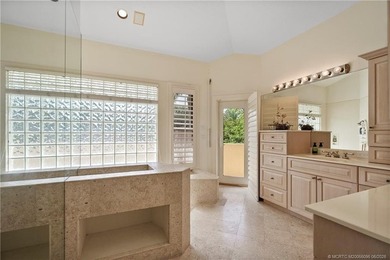 Framed by swaying palms and endless water views, this estate - photo 22