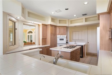 Framed by swaying palms and endless water views, this estate - photo 23