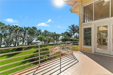 Framed by swaying palms and endless water views, this estate - photo 24
