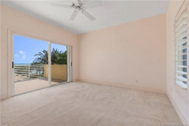 Framed by swaying palms and endless water views, this estate - photo 27