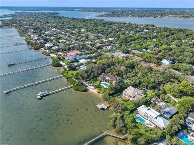 Framed by swaying palms and endless water views, this estate - photo 31