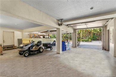 Framed by swaying palms and endless water views, this estate - photo 32