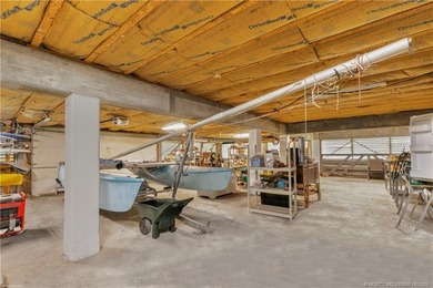 Framed by swaying palms and endless water views, this estate - photo 33