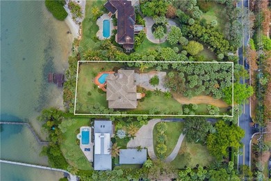 Framed by swaying palms and endless water views, this estate - photo 34
