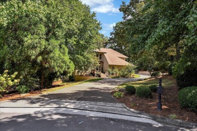 WONDERFUL HOME NESTLED IN THE WOODS ALONG TERRI PINES GOLF