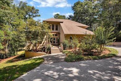 WONDERFUL HOME NESTLED IN THE WOODS ALONG TERRI PINES GOLF