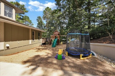 WONDERFUL HOME NESTLED IN THE WOODS ALONG TERRI PINES GOLF