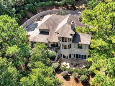 WONDERFUL HOME NESTLED IN THE WOODS ALONG TERRI PINES GOLF