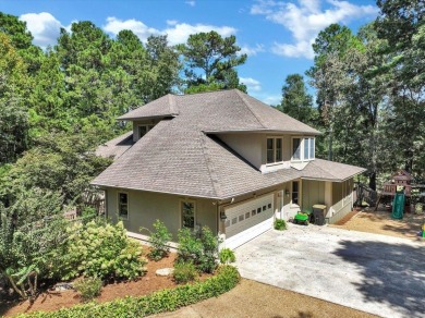 WONDERFUL HOME NESTLED IN THE WOODS ALONG TERRI PINES GOLF