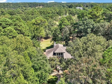 WONDERFUL HOME NESTLED IN THE WOODS ALONG TERRI PINES GOLF