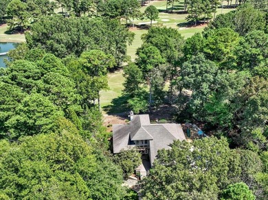 WONDERFUL HOME NESTLED IN THE WOODS ALONG TERRI PINES GOLF