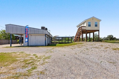 Discover a rare waterfront retreat where coastal living comes - photo 1