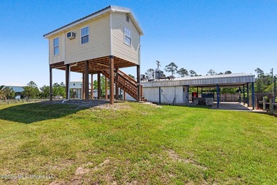 Discover a rare waterfront retreat where coastal living comes - photo 2
