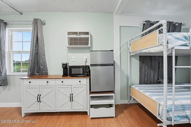 Discover a rare waterfront retreat where coastal living comes - photo 3