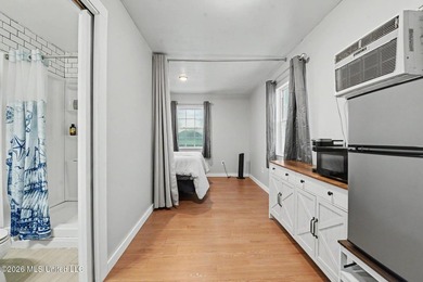 Discover a rare waterfront retreat where coastal living comes - photo 5