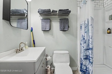Discover a rare waterfront retreat where coastal living comes - photo 9