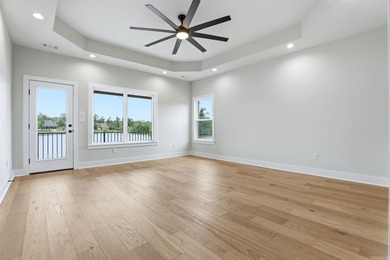 Wake up each day to breathtaking lake views in this exceptional - photo 19