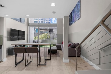 Experience true loft living in the heart of Brickell with this