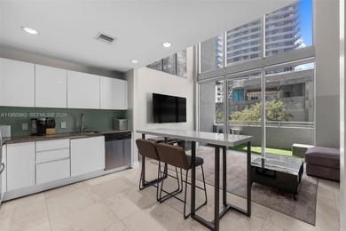 Experience true loft living in the heart of Brickell with this
