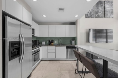 Experience true loft living in the heart of Brickell with this
