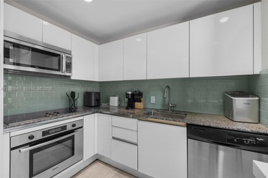 Experience true loft living in the heart of Brickell with this