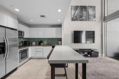 Experience true loft living in the heart of Brickell with this