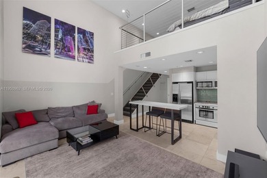 Experience true loft living in the heart of Brickell with this