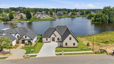 Wake up each day to breathtaking lake views in this exceptional - photo 37