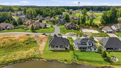Wake up each day to breathtaking lake views in this exceptional - photo 38