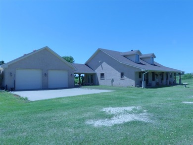 135 acres of gently rolling north Texas pastureland. The almost - photo 3