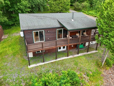 Log home living on Rangeley Lake! This home promises a blend of - photo 5