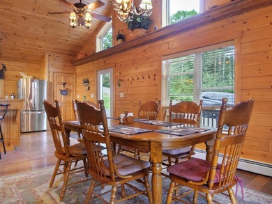 Log home living on Rangeley Lake! This home promises a blend of - photo 8