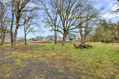 Enjoy 1.15 level acres with a creek running through it, right in - photo 4