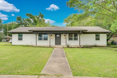 Recently renovated home on corner lot in established - photo 1