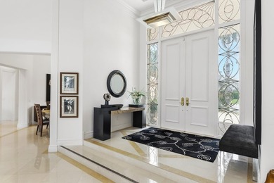 This stunning 2-story, 6-bedroom residence is nestled at the end - photo 6