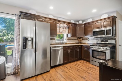 Welcome to this beautifully maintained expanded Cape, where - photo 11