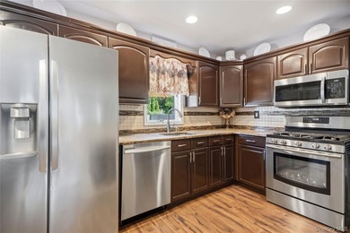 Welcome to this beautifully maintained expanded Cape, where - photo 12
